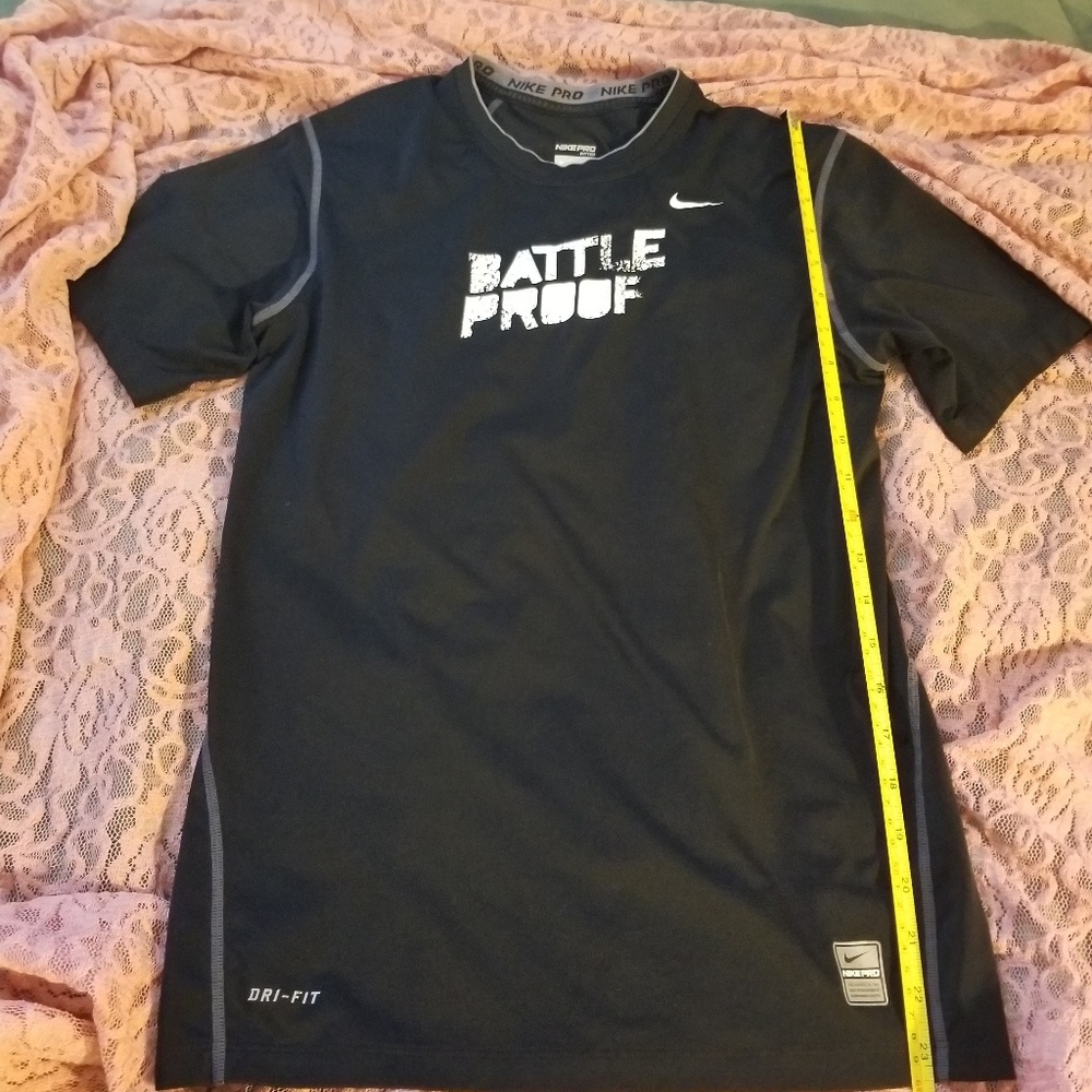 black Nike pro Kids shirt.